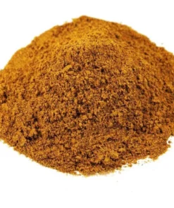 A pile of dark yellow orange Ras El Hanout Spice Mix