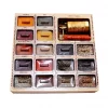 A square box with 17 Spices Set individually packed in an array of colours with a complimentary pepper grinder.