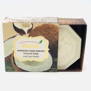 Box with a halved coconut and coconut milk slightly open with hexagonal Organic Coconut Soap.