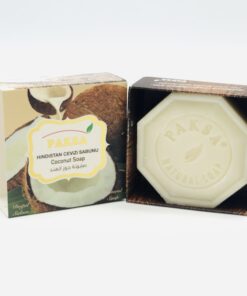 Box with a halved coconut and coconut milk open with hexagonal Organic Coconut Soap.