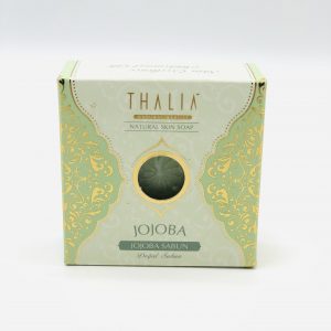 Box in green, light green, golden color with green Organic Jojoba Soap inside.