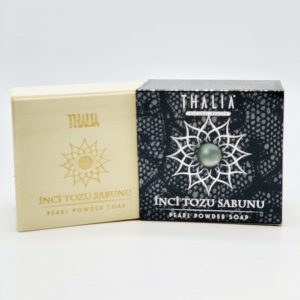 Open Grey box with star and pearl showing a square bar of Organic Pearl Powder Soap.