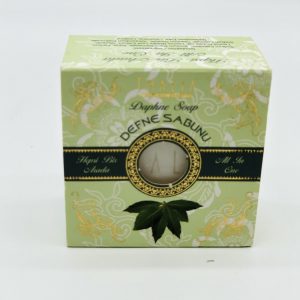 Box with dark green line and picture of Bay Leaf inside a square, white bar of Organic Bay Leaf Soap.