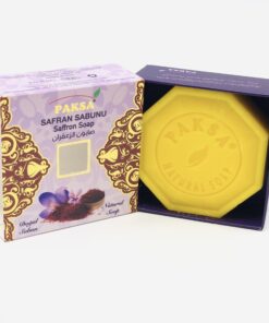 Open purple golden box with Saffron flower and a hexagonal yellow coloured Organic Saffron Soap.