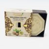 Box with Macadamia nuts slightly open showing a hexagonal Organic Macadamia Soap.