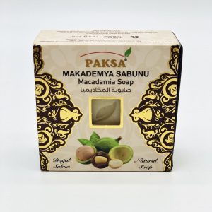 Closed box with Macadamia nuts showing a hexagonal Organic Macadamia Soap.