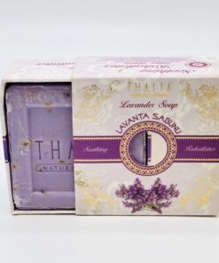 Half open beige, purple, golden box with Lavender showing a square bar of purple Organic Lavender Soap