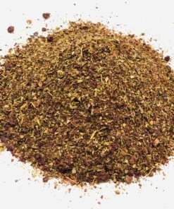 A pile of Salad Spice Mix on a white background