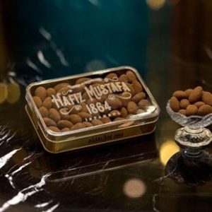 Hafiz Mustafa Metal Box and glass bowl filled with Cinnamon Coated Almond