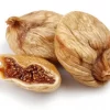 Organic Figs, two whole, one halved on a white background